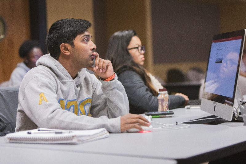 ACIS 5514 student attentive in class.