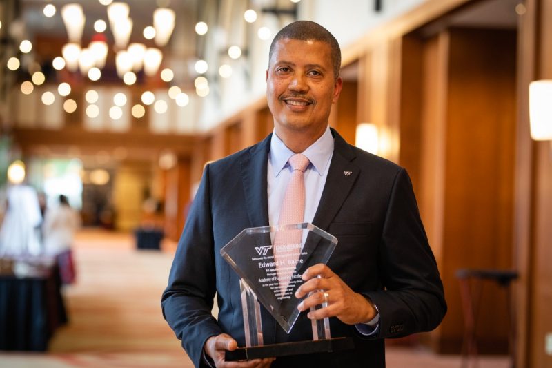 Ed Baine with his Academy of Engineering Excellence award