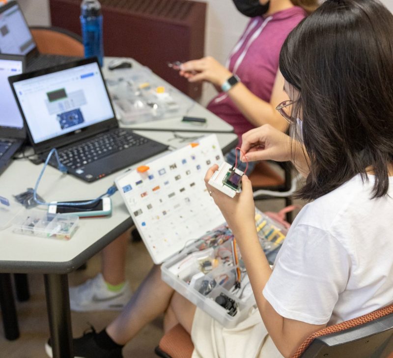 student works with a wiring kit