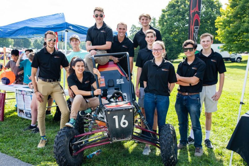 SAE Team poses on their vehicle