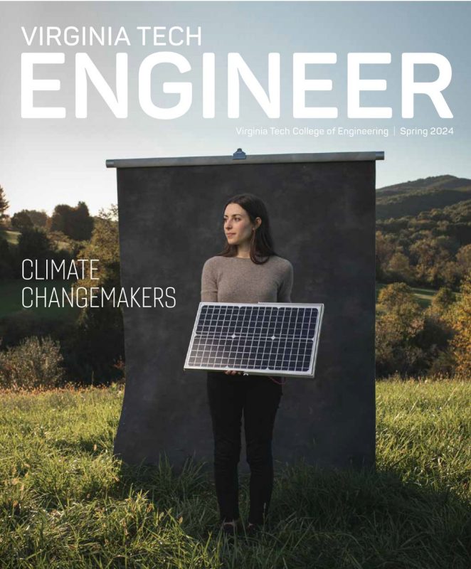 Virginia Tech Engineer magazine cover with a woman in a field holding a solar panel.