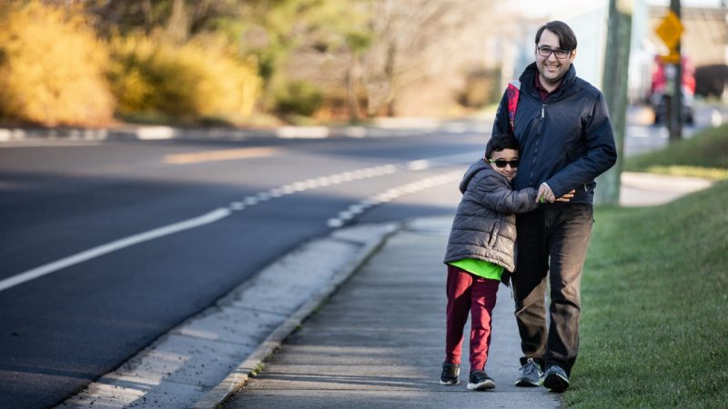 Mustafa walking his kid