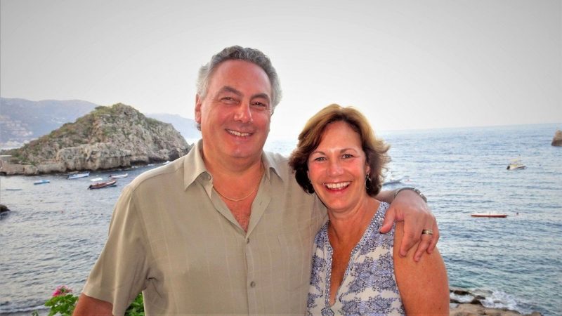 The Moracos in front of an ocean view.