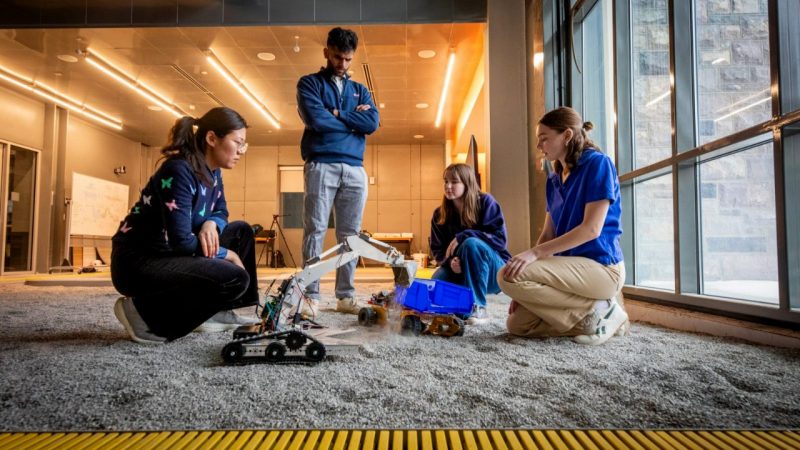 Students working in the autonomous mine.