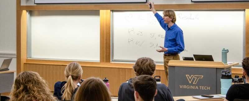 Professor lecturing to students in class