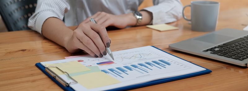 Female looking at a marketing paperwork