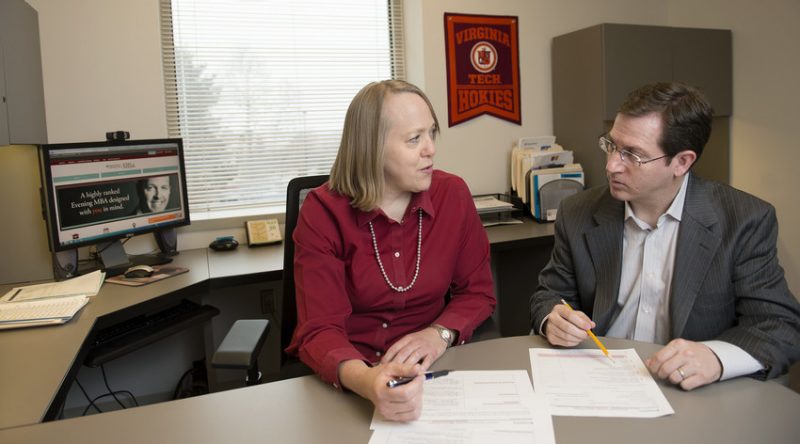 dana and brian at desk