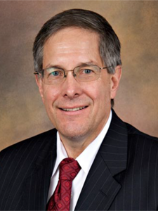 Professional image of Tom Clarke